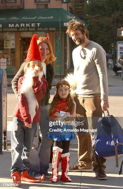 Julianne Moore and Bart Freundlich join their son Caleb Freundlich and daughter Liv Helen Freundlich while trick-or-treating in midtown on October...