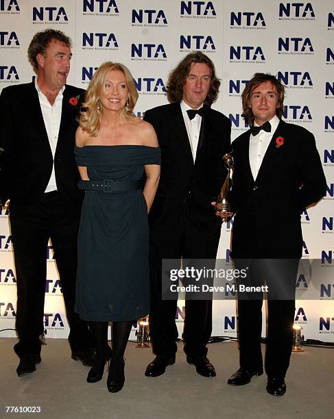 'Top Gear' presenters Jeremy Clarkson, Richard Hammond and James May pose with the award for Most Popular Factual Programme in the Awards Room...