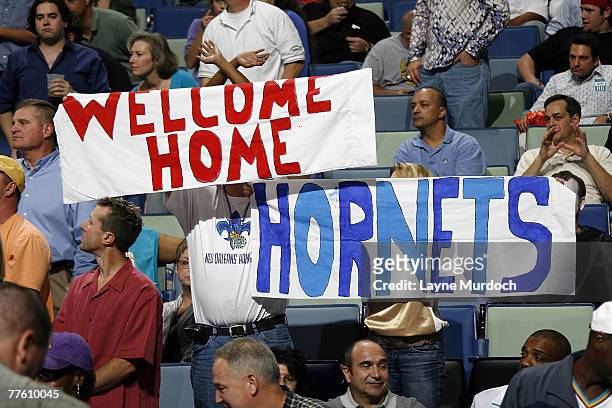 Fans cheer on the New Orleans Hornets at their home opener against the Sacramento Kings on October 31, 2007 at the New Orleans Arena in New Orleans,...