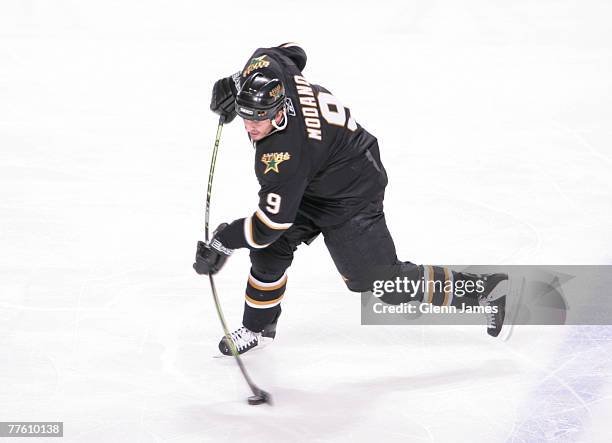 Mike Modano of the Dallas Stars winds up a shot against the Chicago Blackhawks at the American Airlines Center on October 31, 2007 in Dallas, Texas.