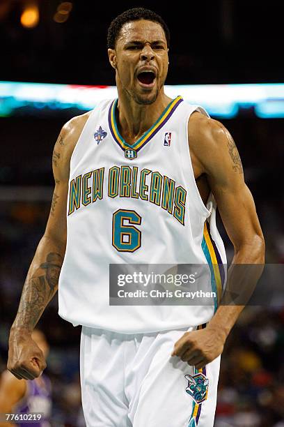 Tyson Chandler of the New Orleans Hornets celebrates after scoring against the Sacramento Kings on October 31, 2007 at the New Orleans Arena in New...