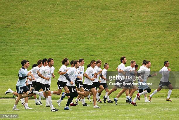 Sydney FC players jog during a Sydney FC training session at Macquarie University Sporting Fields on November 1, 2007 in Sydney, Australia.