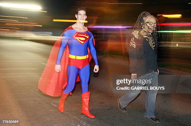 Man dressed as Superman and another as a ghoul take part in the West Hollywood Halloween Costume Carnival 31 October 2007. The world-famous costume...