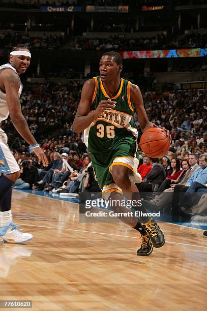 Kevin Durant of the Seattle Supersonics drives to the basket against Carmelo Anthony of the Denver Nuggets on October 31, 2007 at the Pepsi Center in...
