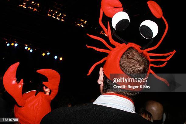 Fans dressed as lobsters watch the The B-52's performance onstage at Roseland Ballroom on October 31, 2007 in New York City.