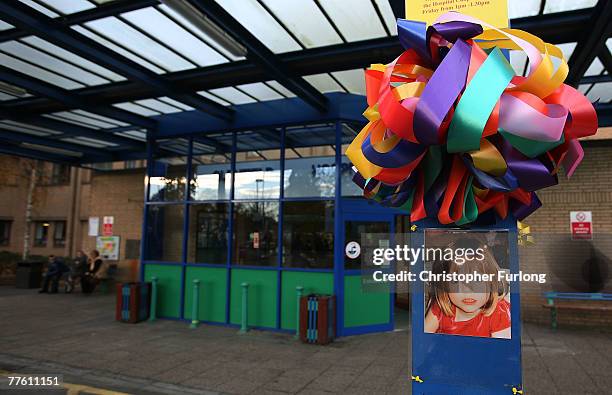 Poster of missing child Madeleine McCann adorns the entrance to Glenfield Hospital, where her father Gerry McCann, a consultant cardiologist, returns...