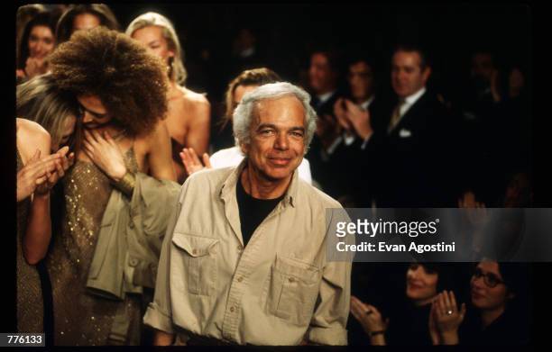 Designer Ralph Lauren stands on stage at the 7th on Sixth Fashion Show October 30, 1996 in New York City. Ralph Lauren became founder, designer and...