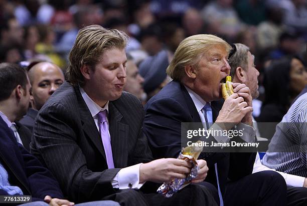 Eric Trump and Donald Trump attend the Chicago Bulls vs New Jersey Nets game at the IZOD Center on October 31, 2007 in East Rutherford, New York.