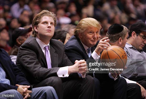 Eric Trump and Donald Trump attend Chicago Bulls vs New Jersey Nets game at the IZOD Center on October 31, 2007 in East Rutherford, New York.