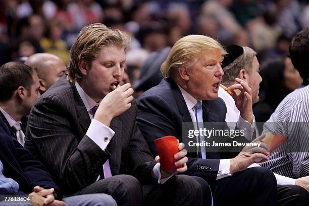 Eric Trump and Donald Trump attend Chicago Bulls vs New Jersey Nets game at the IZOD Center on October 31, 2007 in East Rutherford, New York.