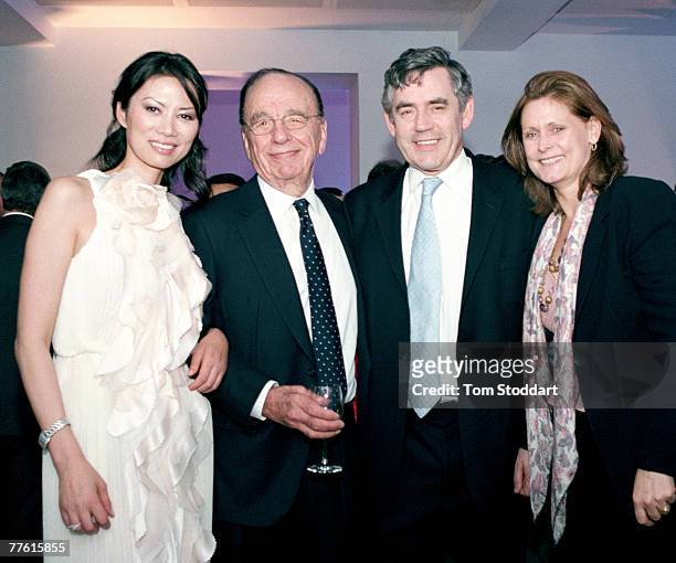 News Corporation Chairman and CEO Rupert Murdoch photographed with his wife Wendi and new British Prime Minister Gordon Brown and wife Sarah. The...