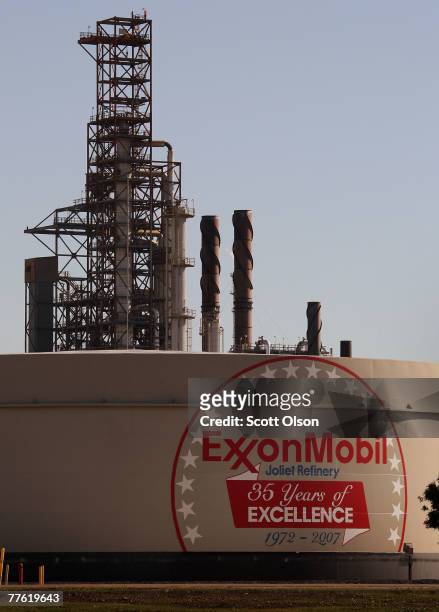 An Exxon Mobil Corp. Logo is painted on a storage tank at the Exxon Mobil refinery November 1, 2007 in Joliet, Illinois. The oil company reported a...