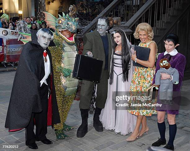 Al Roker dressed as Grandpa Munster, Tiki Barber dressed as Spot Munster, Matt Lauer dressed as Herman Munster,Meredith Vieira Dressed as Lilian...