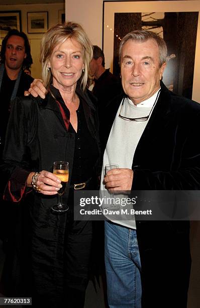 Lorraine Ashton and Terry O'Neill attend a private view of photographs dedicated to Sir Eric Clapton to celebrate his latest book 'Eric Clapton: The...