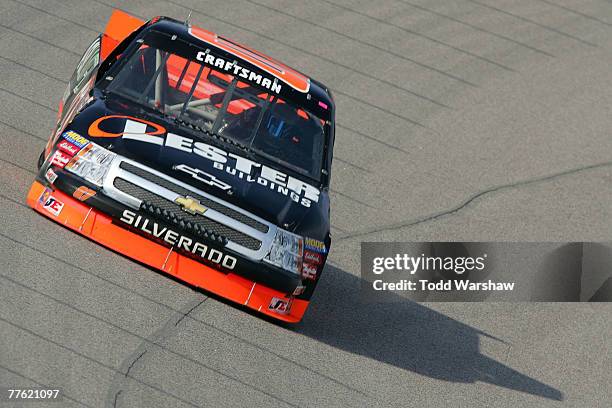 Tim Sauter, driver of the Lester Building/ASI Limited Chevrolet, during practice for the NASCAR Craftsman Truck Series Silverado 350K at Texas Motor...