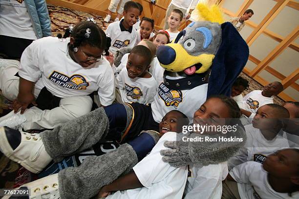 The Indiana Pacers mascot, Bowser, entertains kids from the Pacers Learning Centers as the Pacers tipped off their Read to Achieve program at the...