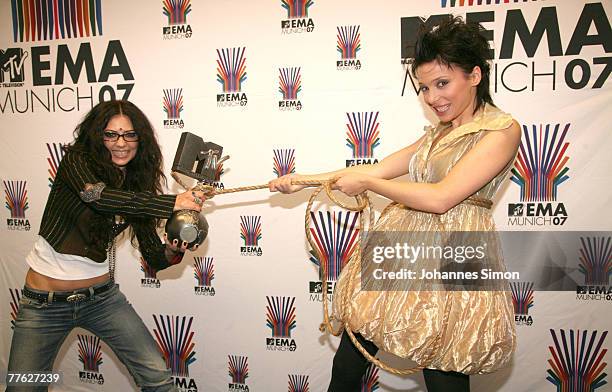 Ukrainian singer Lama and VJ Irena Karpa pose with the MTV trophy during the MTV Europe Music Awards 2007 at Olympiahalle on November 1, 2007 in...