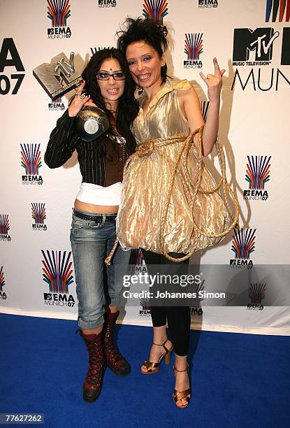 Ukrainian singer Lama and VJ Irena Karpa pose with the MTV trophy during the MTV Europe Music Awards 2007 at Olympiahalle on November 1, 2007 in...