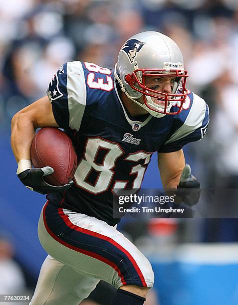 Wide receiver Wes Welker of the New England Patriots runs down field in a game against the Dallas Cowboys at Texas Stadium on October 14, 2007 in...