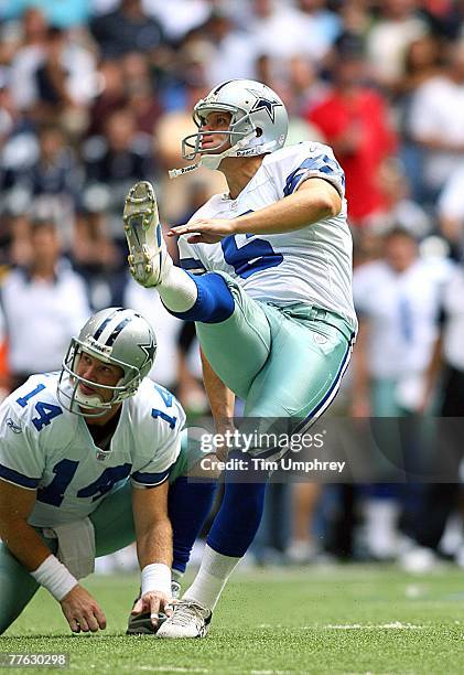 Kicker Nick Folk of the Dallas Cowboys kicks a field goal in a game against the New England Patriots at Texas Stadium on October 14, 2007 in Irving,...