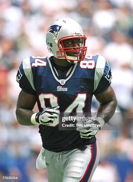 Tight end Benjamin Watson of the New England Patriots runs off the field in a game against the Dallas Cowboys at Texas Stadium on October 14, 2007 in...