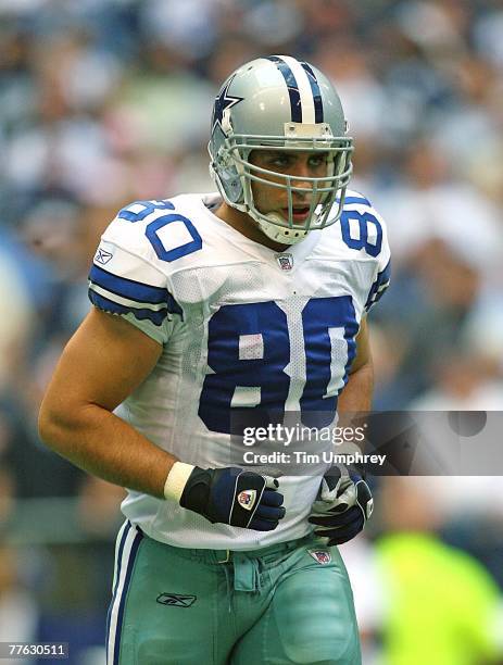 Tight end Anthony Fasano of the Dallas Cowboys runs off the field at halftime in a game against the New England Patriots at Texas Stadium on October...