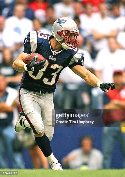 Wide receiver Wes Welker of the New England Patriots runs down field in a game against the Dallas Cowboys at Texas Stadium on October 14, 2007 in...