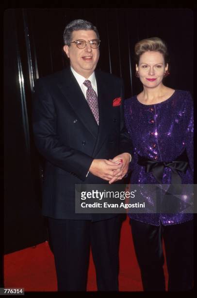 Composer Marvin Hamlisch stands with his wife Terre Blair at the premiere of the film "The Mirror Has Two Faces" November 10, 1996 in New York City....