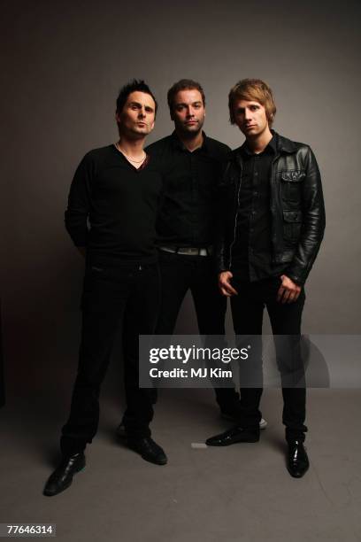 Matthew Bellamy, Chris Wolstenholme and Dominic Howard of Muse poses in the Studio during the MTV Europe Music Awards 2007 at the Olympiahalle on...