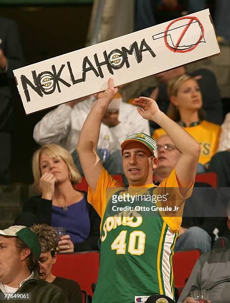 Fan of the Seattle SuperSonics holds a sign prior to the game against the Phoenix Suns on November 1, 2007 at Key Arena in Seattle, Washington. The...