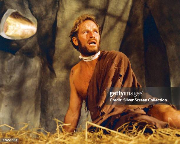 American actor Charlton Heston as stranded astronaut George Taylor in the film 'Planet of the Apes', 1968.