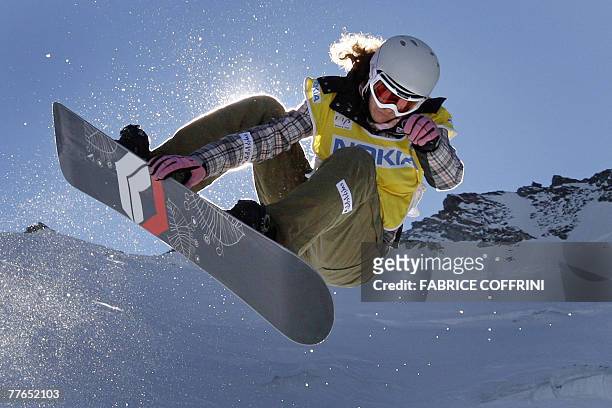 Switzerland's Manuela Laura Pesko competes to captures the third place in the Womens' half-pipe final at the Snowboard FIS World Cup competition 02...