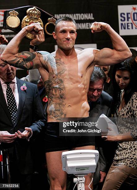Mikkel Kessler goes on the scales during the weigh-in before his super-middleweight title fight against Joe Calzaghe on November 2, 2007 at St....