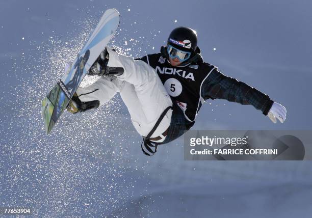 Dutch rider Dolf van der Wal competes to place 10th in the Mens' half-pipe Snowboard FIS World Cup competition 02 November 2007 in Saas-Fee....