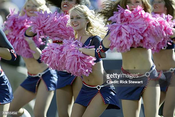 Buffalo Jills cheerleaders dance during a timeout between the Buffalo Bills and Baltimore Ravens on October 21, 2007 at Ralph Wilson Stadium in...