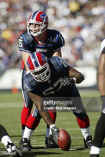 Trent Edwards of the Buffalo Bills readies to take a snap from Melvin Fowler against the Baltimore Ravens on October 21, 2007 at Ralph Wilson Stadium...