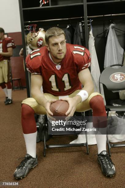 Alex Smith of the San Francisco 49ers looks on in the locker room before the NFL game against the New Orleans Saints at Monster Park on October 28,...