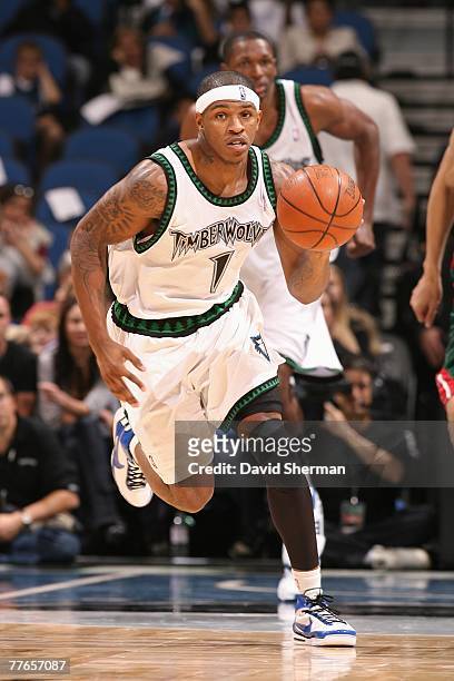 Rashad McCants of the Minnesota Timberwolves moves the ball up court during a preseason game against the Milwaukee Bucks at the Target Center on...