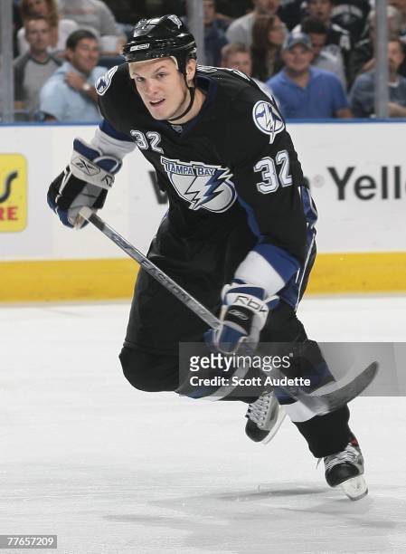 Matt Smaby of the Tampa Bay Lightning charges up ice against the Philadelphia Flyers at St. Pete Times Forum on October 25, 2007 in Tampa, Florida.