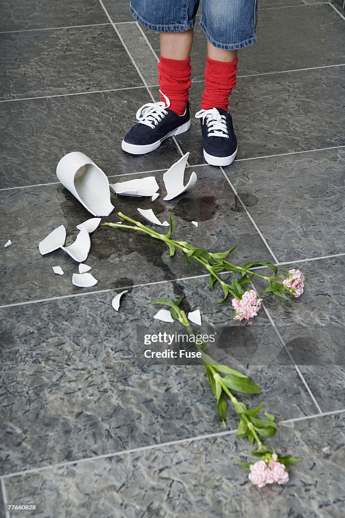 Boy with Broken Vase