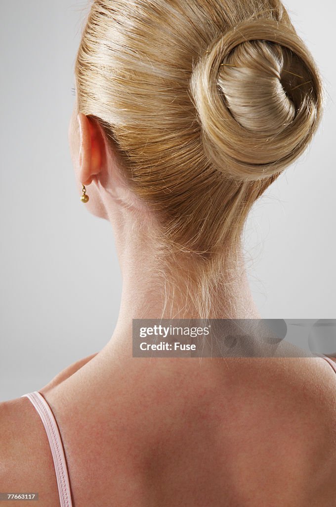 Woman Wearing Bun in Hair