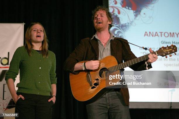Musicians Glen Hansard and Marketa Irglova perform at the Hollywood Reporter/Billboard Film & TV Music Conference Day 2 at the Beverly Hilton Hotel...