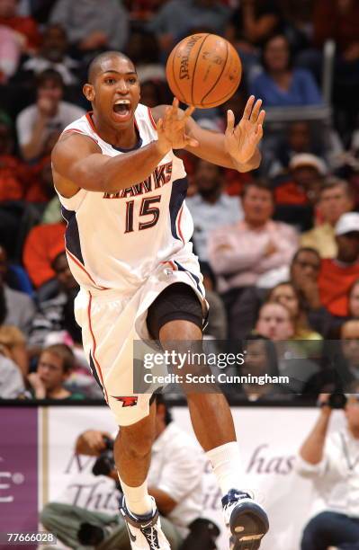 Al Horford of the Atlanta Hawks makes an outlet pass against the Dallas Mavericks at Philips Arena on November 2, 2007 in Atlanta, Georgia. NOTE TO...