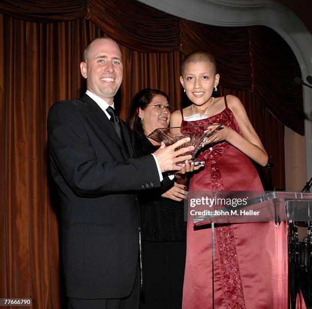 Greg Garcia and the cast of the television show "My Name Is Earl" accept the Entertainment Industry Wish Award from Danielle Barrios, Wish Child, at...