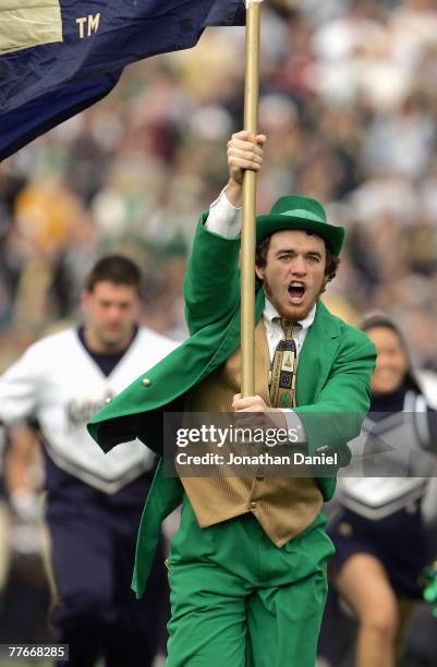 The Leprechaun and cheerleaders of the Notre Dame Fighting Irish enter the field before the game against the Boston College Eagles on October 13,...