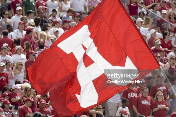 Alabama Crimson Tide flag is flown around the stadium during a 24 to 13 win over the Arkansas Razorbacks on September 24, 2005 at Bryant-Denny...