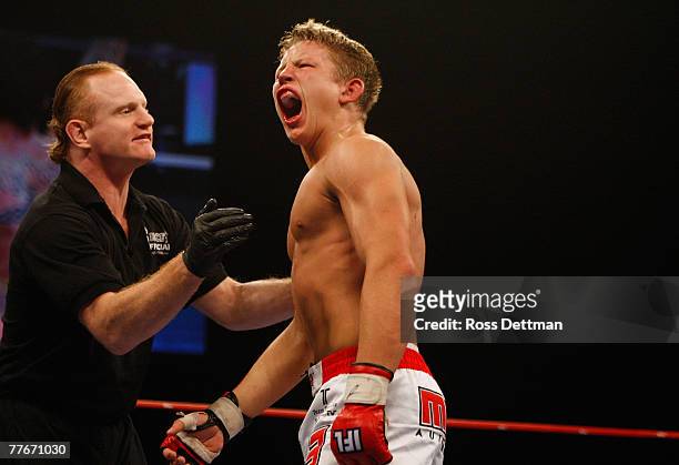 Chris Horodecki of the Anacondas reacts during his win by decision against Bart Palaszewski of the Silverbacks during their Lightweight bout at the...