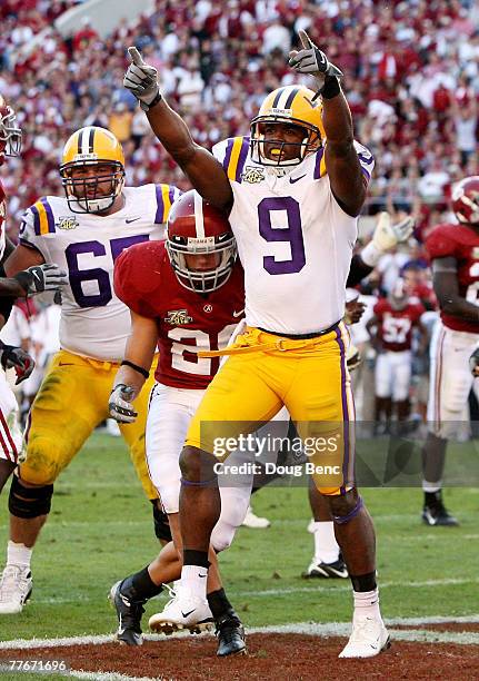 Wide receiver Early Doucet of the LSU Tigers celebrates his touchdown in the first half against the Alabama Crimson Tide at Bryant-Denny Stadium on...