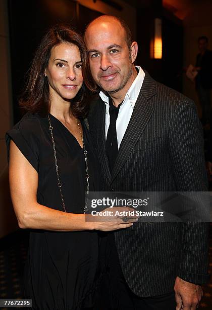 Joyce Varvatos and husband John Varvatos attend a private screening of "Lions for Lambs" hosted by Andrew Borrok at the Dolby Screening Room on...
