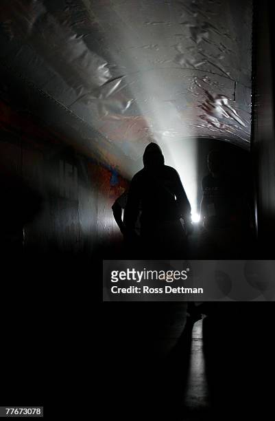Alex Schoenauer of the Anacondas waits in the tunnel before he is introduced for his bout against Vladdy Matyushenko of the Sabers during their Light...
